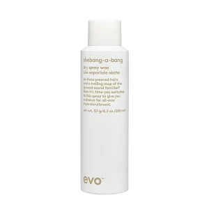 A sleek, white spray bottle with minimalist branding and a silver cap