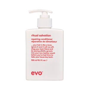 A white bottle of conditioner with a pump dispenser and playful text on it