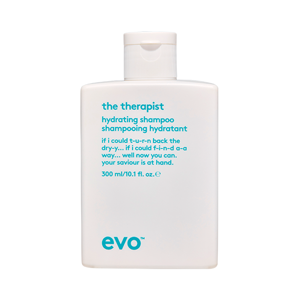 A white bottle of hydrating shampoo features playful text and a minimalist design