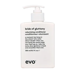 A white conditioner bottle features playful text and a sleek pump dispenser