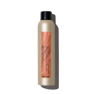 A sleek, cylindrical bottle with a black cap and a textured label