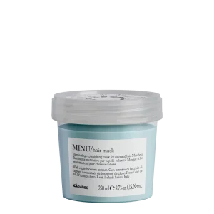 A light blue jar contains a hair mask with labeled instructions