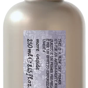 A sleek, silver spray bottle features a label with text and design elements