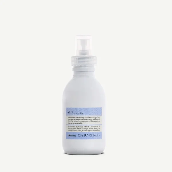 A white bottle with a pump dispenser contains a light blue liquid
