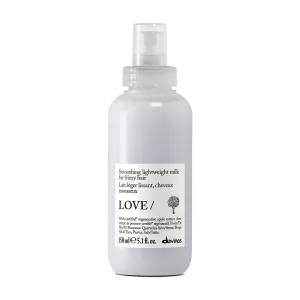 A sleek, white bottle with a pump cap contains a lightweight hair product