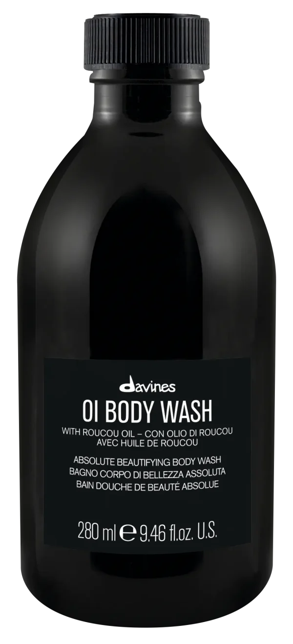 A sleek black bottle with a minimalistic label, containing body wash