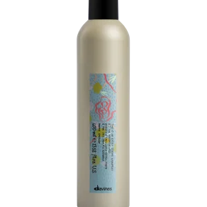 A sleek bottle of shampoo features colorful, abstract designs on its label