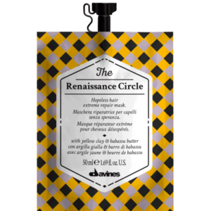 A yellow and black checkered pouch contains a hair repair mask labeled "The Renaissance Circle."