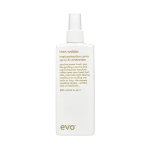 A sleek bottle with a spray nozzle and minimalist label design