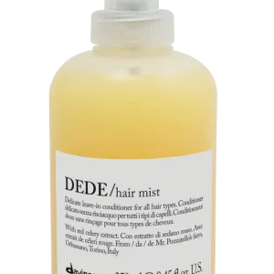 A yellow spray bottle labeled "DEDE/hair mist" stands against a blank background