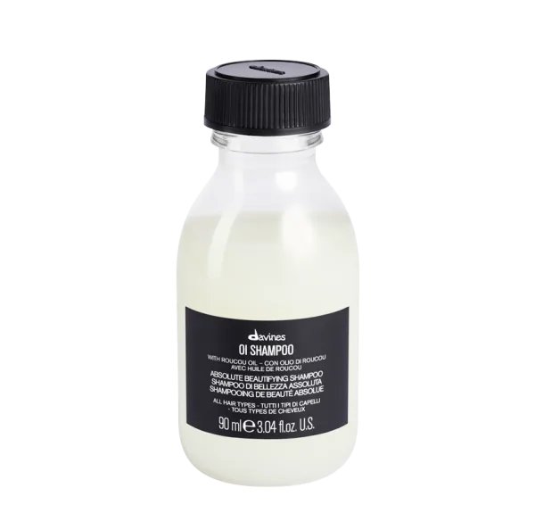 A small bottle of shampoo with a sleek, minimalist design