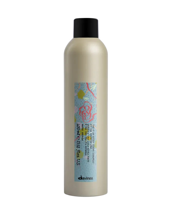 A tall, creamy bottle with a colorful label rests against a plain background