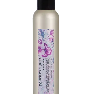 A decorative canister with a floral design and instructions for use