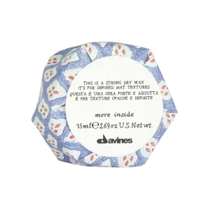 A round container features colorful floral patterns and a label detailing its contents