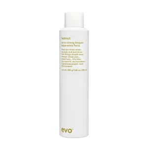 A sleek, white bottle of hair styling product with minimalistic design and text