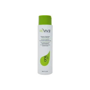 A sleek, white shampoo bottle stands upright with a bright green cap