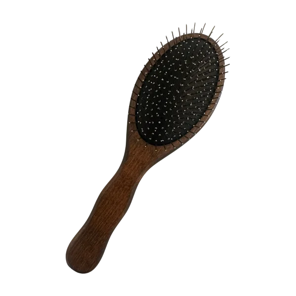 A wooden hairbrush with a padded surface and bristles lies flat