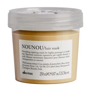 A small jar of hair mask with a light brown label and white lid