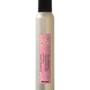 A tall, sleek bottle with a decorative label and a black cap