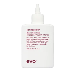 A clear bottle is labeled with product details for a deep clean rinse