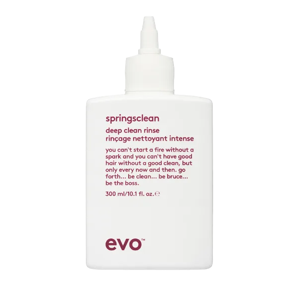 A clear bottle is labeled with product details for a deep clean rinse