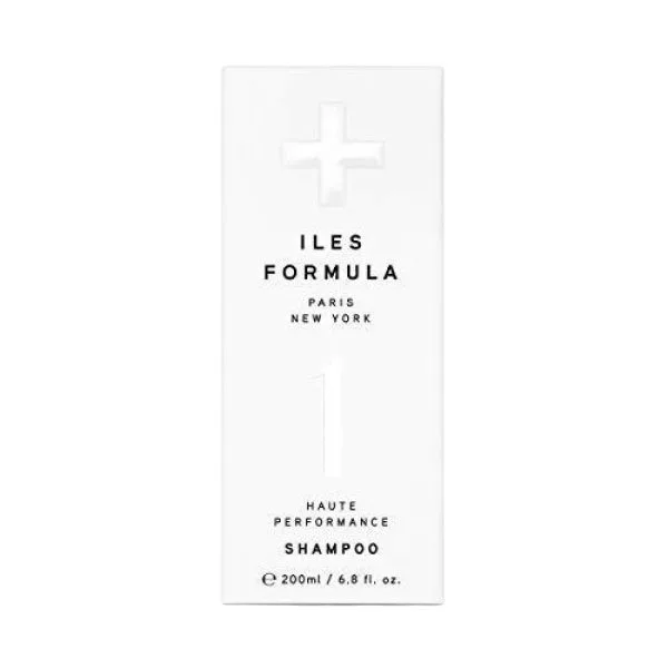 A sleek, minimalist shampoo bottle with a simple design and bold text