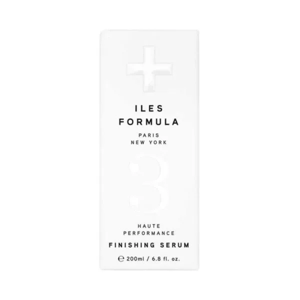 A sleek, minimalist bottle displays a hair finishing serum with elegant labeling
