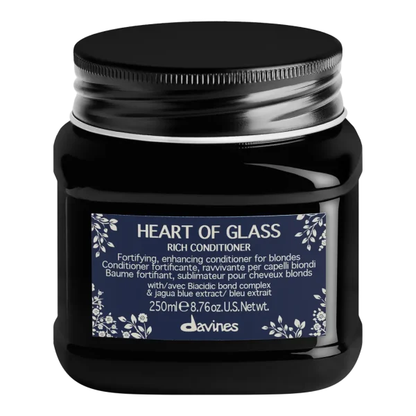 A dark jar labeled "Heart of Glass" contains a rich conditioner for blondes